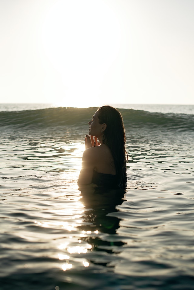 healthy woman swimming in ocean