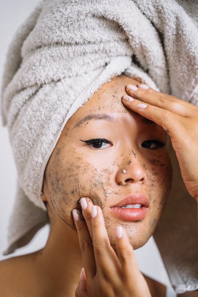 woman with face scrub