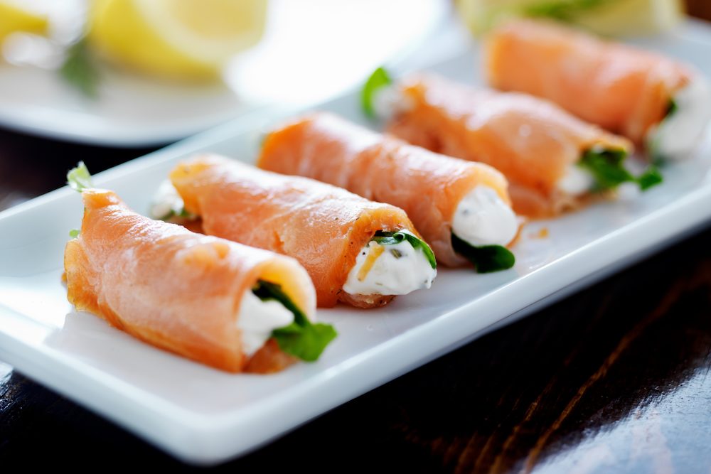 High protein low carb smoked salmon rolls filled with cream cheese.