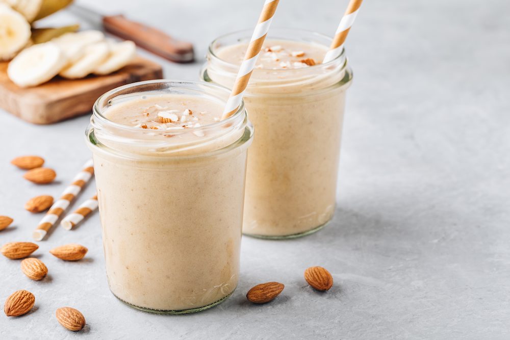 High protein low carb smoothie with almond toppings for a healthy breakfast.