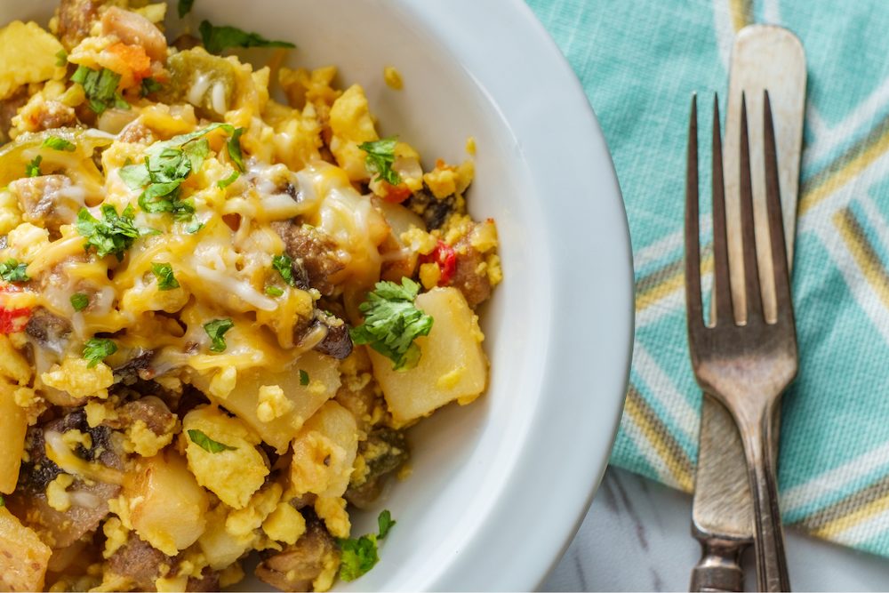 Low carb high protein breakfast scramble with cheese and sausage.