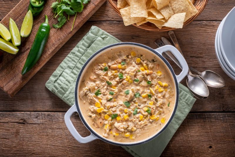 Creamy crockpot chicken recipe with corn, beans, and green chiles, perfect for easy, healthy crockpot meals.