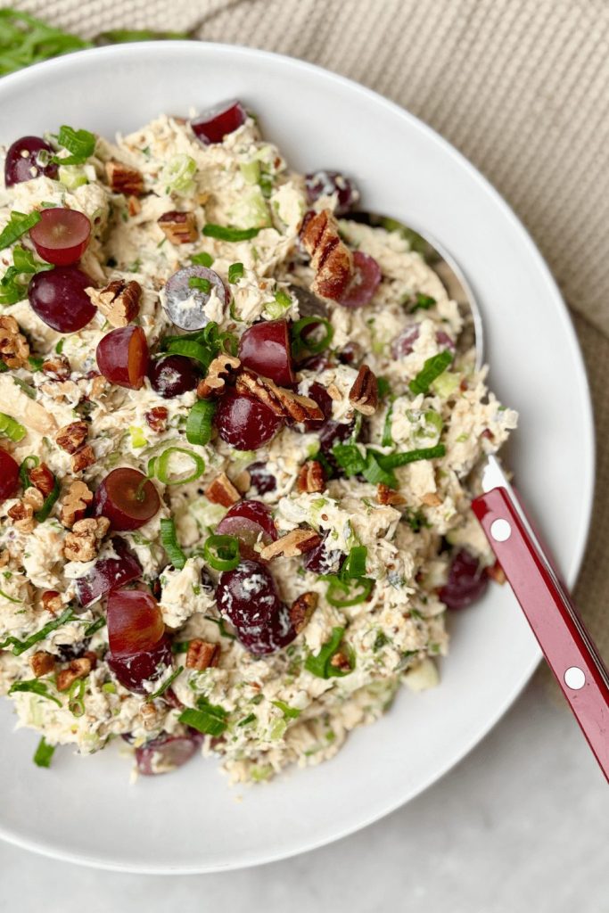 Classic chicken salad with juicy grapes, pecans, and green onion — high in protein, lower in calories, and perfect for meal prep.