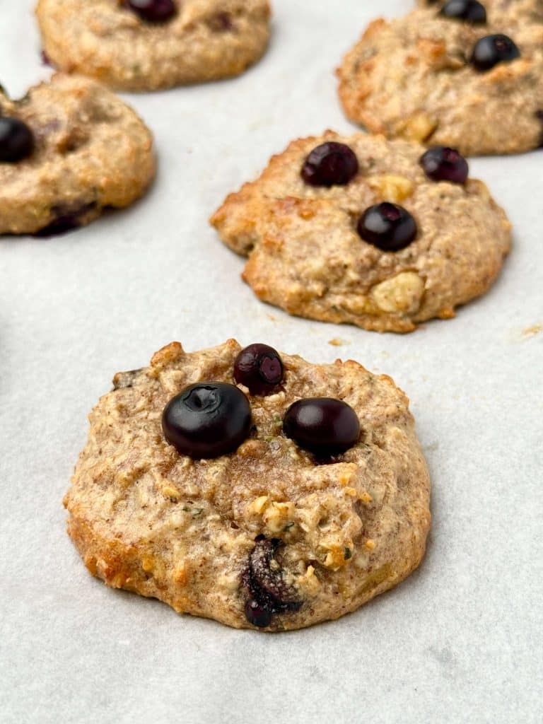 Healthy high protein blueberry breakfast cookies fresh from the oven. Dairy-free, gluten-free recipe packed with superfoods and protein.