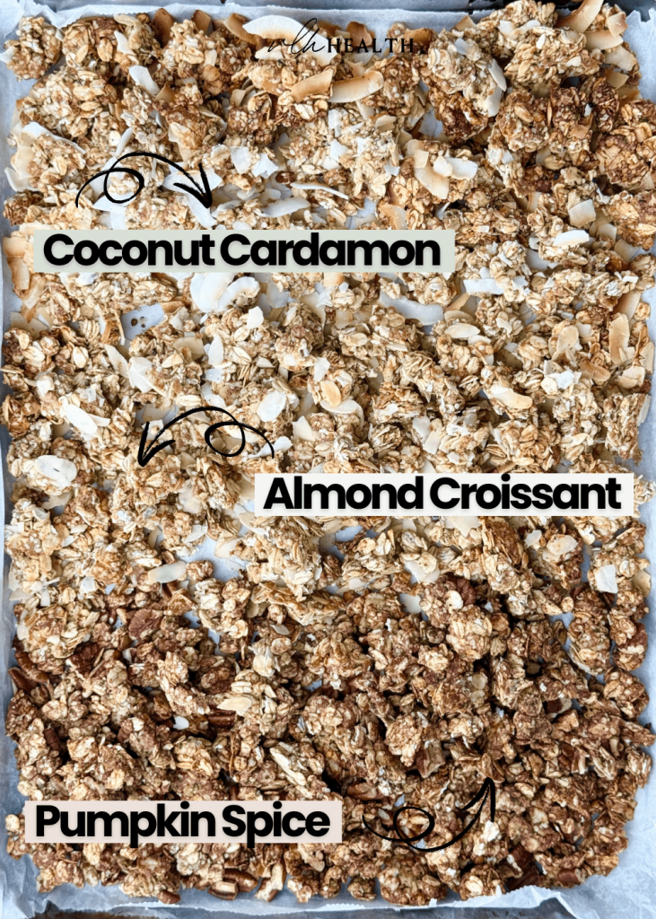 Sheet pan with three fall flavors of homemade protein granola labeled as Coconut Cardamom, Almond Croissant, and Pumpkin Spice.