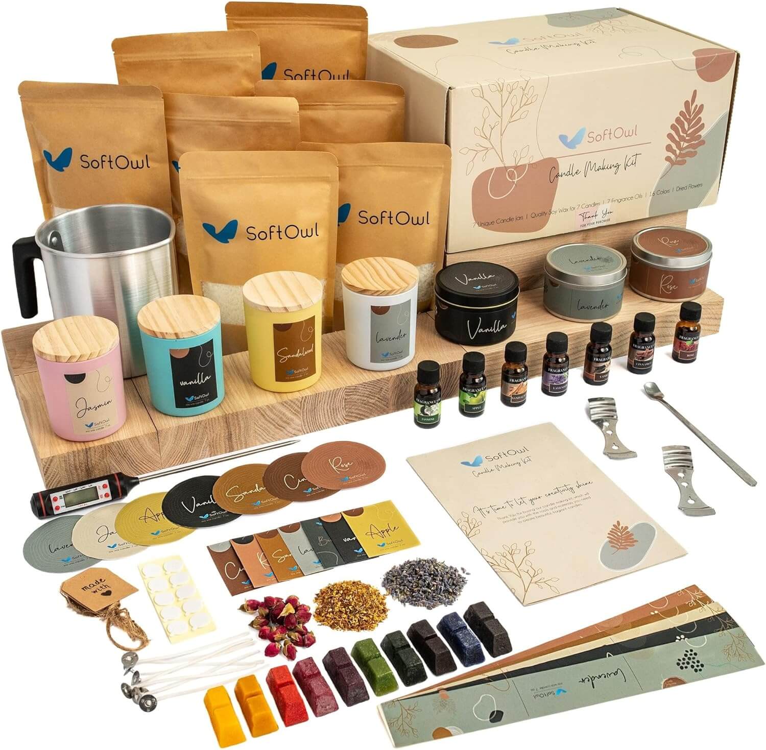 “Complete soy candle making kit with wax, scents, jars, and tools for a cozy at-home DIY candle crafting project.