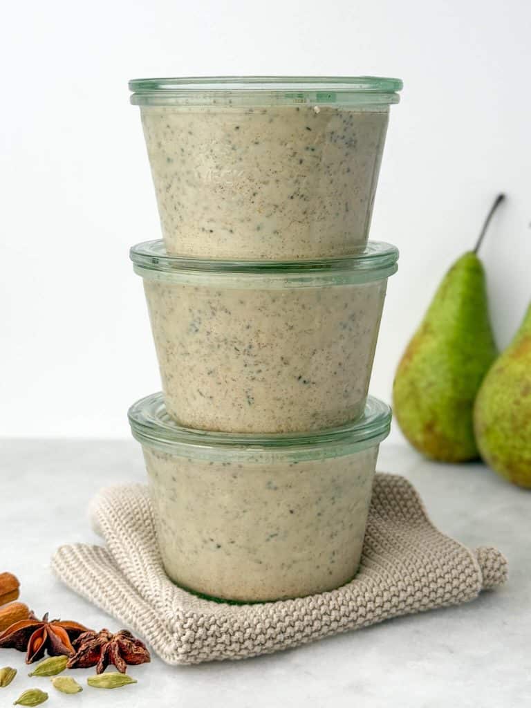 High-protein chai overnight oats portioned into glass containers for easy meal prep breakfasts.