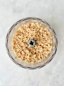 Shredded rotisserie chicken pulsed in a food processor for easy Round Swamp Farm chicken salad copycat recipe.