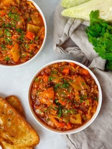 High-protein unstuffed cabbage soup made with ground beef, vegetables, and rich tomato broth
