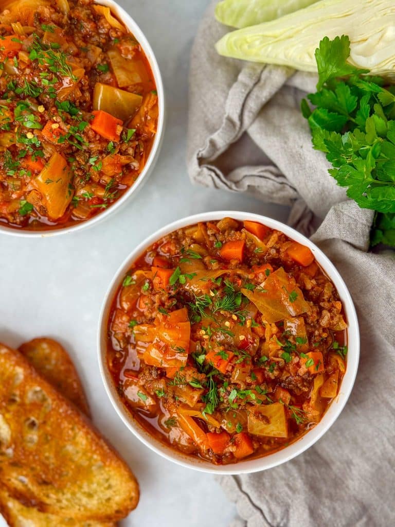 High-protein unstuffed cabbage soup made with ground beef, vegetables, and rich tomato broth