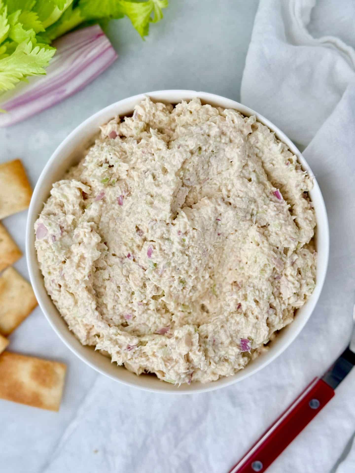 Round Swamp Farm chicken salad copycat in a white bowl, creamy and velvety with finely shredded chicken, celery, and shallot.