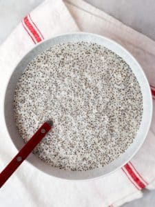 Coconut chia seed pudding set and thickened in a bowl