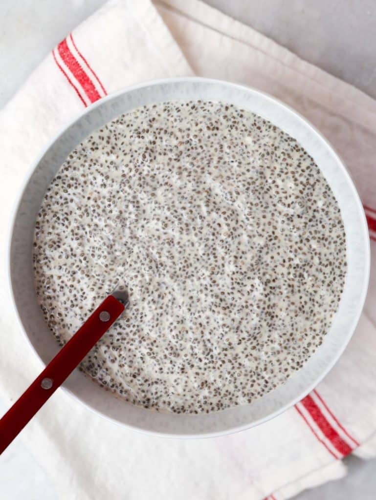 Coconut chia seed pudding set and thickened in a bowl