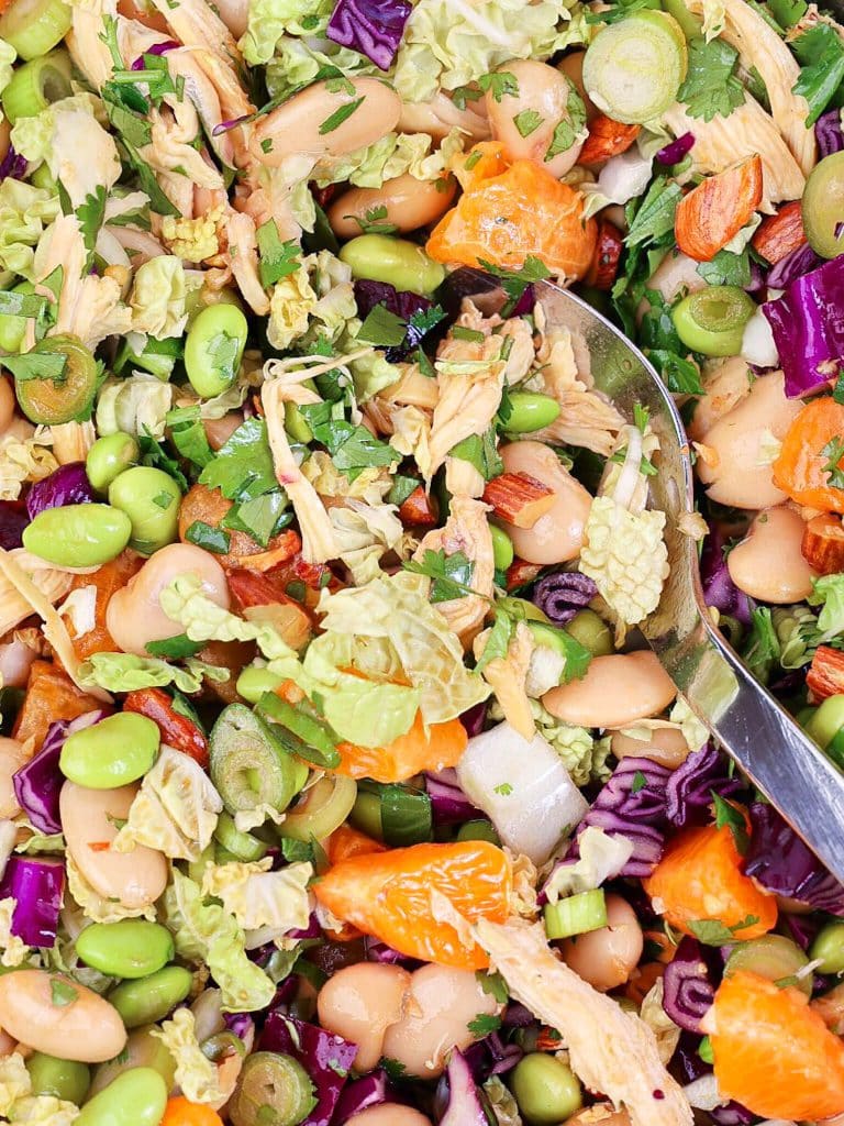 close up of chinese chicken dense bean salad with mandarins and roasted almonds