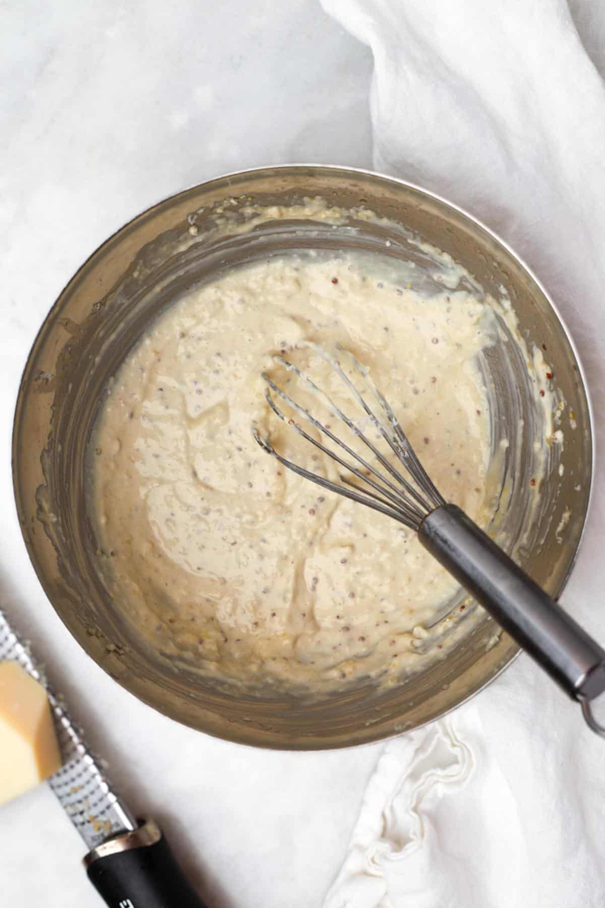 Homemade greek yogurt caesar dressing whisked until smooth