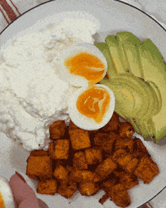 Assembling a cottage cheese breakfast bowl with sweet potato