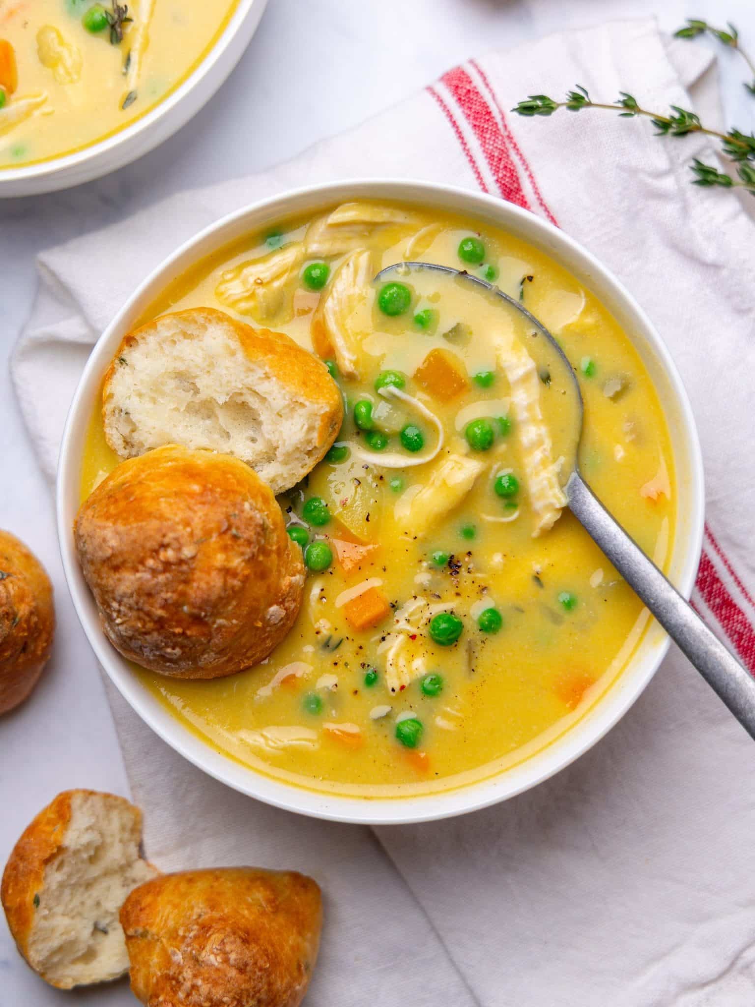 High protein chicken pot pie soup with a cottage cheese biscuit, peas and shredded chicken